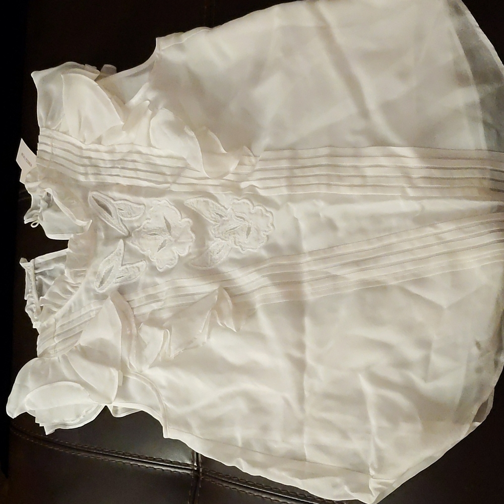 Rebecca Taylor flutter sleeve with attached cami.  Brand new tag still on.